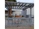 Covered patio with grill, smoker, and seating area at 5830 Bonnie St, Pahrump, NV 89048