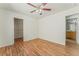 Spacious bedroom featuring wood-look floors and ample closet space at 5617 Granville Lake St, North Las Vegas, NV 89031