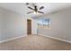 Comfortable bedroom with ceiling fan, window, and closet at 10993 Ladyburn Ct, Las Vegas, NV 89141