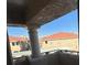 Balcony overlooking community with partial view of neighboring buildings at 370 Manti Pl # 21, Henderson, NV 89014