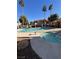 Inviting pool and spa with lounge chairs for relaxing at 370 Manti Pl # 21, Henderson, NV 89014