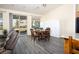 Bright dining area with wood table and chairs, near sliding door at 531 Hagens Aly, Mesquite, NV 89027