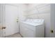 Laundry room with washer, dryer, and shelving at 134 Skytop Dr, Henderson, NV 89015