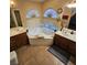 Bathroom with corner bathtub, double sinks, and plenty of counter space at 11261 Playa Caribe Ave, Las Vegas, NV 89138