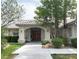 Inviting front entrance with double doors, landscaping, and a walkway at 3767 Darren Thornton Way, Las Vegas, NV 89120