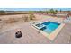 Inviting pool and spa with fire pit and spacious patio at 4065 W Maulding Ave, Las Vegas, NV 89139