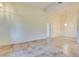 Bright dining room with tile floors and chandelier at 700 Carnegie St # 2723, Henderson, NV 89052