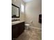 Simple bathroom with toilet, sink, and granite countertop at 7110 Crowntop Cir, Las Vegas, NV 89118