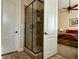 Elegant bathroom with dark wood vanity and tile flooring at 7110 Crowntop Cir, Las Vegas, NV 89118