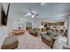 Spacious living room with tile floors and an open kitchen at 1713 Serafina St, Las Vegas, NV 89102