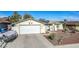 Single story home with solar panels and landscaped yard at 4100 Springhill Ave, Las Vegas, NV 89121