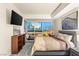 Spacious bedroom with city views and built-in shelving at 4575 Dean Martin Dr # 1103, Las Vegas, NV 89103