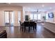 Open concept dining area with view into living room and patio at 169 Bella Noche St, Las Vegas, NV 89138