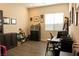 Bright home office with desk and built-in shelves at 169 Bella Noche St, Las Vegas, NV 89138