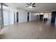 Open living area with hardwood floors and access to kitchen at 8925 W Flamingo Rd # 221, Las Vegas, NV 89147