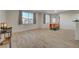 Open concept dining area with wood-look tile floors at 50 Aura De Blanco St # 17101, Henderson, NV 89074