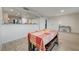 Open concept dining area with a view into the kitchen at 50 Aura De Blanco St # 17101, Henderson, NV 89074