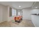 Bright dining area with wood-look floors and patio access at 50 Aura De Blanco St # 17101, Henderson, NV 89074