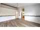 Bedroom with laminate wood flooring and decorative border at 5408 Sweet Shade St, Las Vegas, NV 89130