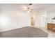 Living room with grey carpet and built-in shelving at 5408 Sweet Shade St, Las Vegas, NV 89130