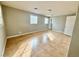 Well-lit bedroom with tile floors and access to hallway at 55 Church St, Henderson, NV 89015