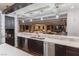 Modern kitchen with white countertops and dark cabinets at 8 Rue Mediterra Dr, Henderson, NV 89011