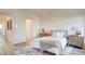 Comfortable bedroom with a queen-size bed and wood floors at 1124 Prospering Creek St, Las Vegas, NV 89135