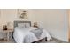 Bright bedroom with a queen bed, nightstand, and decor at 1164 Prospering Creek St, Las Vegas, NV 89135