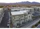 Aerial view of modern townhome community with attached garages at 1175 Blossom Point St, Las Vegas, NV 89135