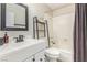 Clean bathroom with a tub, toilet and vanity at 2528 Laconia Ave, Las Vegas, NV 89121