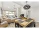 Spacious dining area adjacent to living room and kitchen at 2528 Laconia Ave, Las Vegas, NV 89121