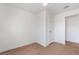 Spacious bedroom with light walls, wood-look flooring, and a closet at 3045 Cedar St, Las Vegas, NV 89104