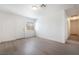 Spacious living room with wood floors and hallway access at 3045 Cedar St, Las Vegas, NV 89104