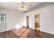 Spacious bedroom with wood floors and ensuite bathroom at 517 Red Canvas Pl, Las Vegas, NV 89144