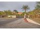 Gated entrance to Del Webb community in Lake Las Vegas with palm trees at 53 Stone Yucca Ct, Henderson, NV 89011