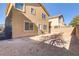 Spacious backyard with a large patio area at 542 Halloran Springs Rd, Las Vegas, NV 89148