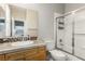 Bathroom with tiled shower/tub combo, vanity, and toilet at 7208 Iron Oak Ave, Las Vegas, NV 89113