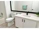 Modern bathroom with white vanity and updated fixtures at 7717 Constanso Ave # 204, Las Vegas, NV 89128