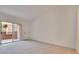 Bright bedroom with sliding door to balcony at 7717 Constanso Ave # 204, Las Vegas, NV 89128