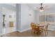 Small dining area with wooden table and chairs near kitchen at 2188 Chapman Ranch Dr, Henderson, NV 89012