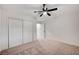 Bedroom with double door closet and ceiling fan at 2540 Highvale Dr, Las Vegas, NV 89134