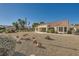 Landscaped backyard with gravel and desert plants at 3100 Angelica Ct, Las Vegas, NV 89134