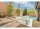 Relaxing backyard oasis with built-in spa and pool at 3163 Biccari Ave, Henderson, NV 89044