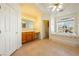 Bathroom with large soaking tub, double vanity, and window at 5421 E Chasemoor St, Pahrump, NV 89061