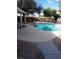 Inviting kidney-shaped pool with ample surrounding patio space at 6542 Solitary Ave, Las Vegas, NV 89110