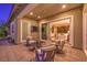 Outdoor patio with seating area, and sliding glass doors leading inside at 1199 N Water St, Henderson, NV 89011