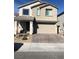 Two-story house with attached garage and landscaping at 3164 Rowan Brook Ave, Henderson, NV 89052