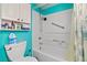 Bright teal bathroom with shower/tub and updated toilet at 3550 Bay Sands Dr # 1003, Laughlin, NV 89029