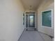 Front entry with glass door and sidelights at 3633 Laughlin Blvd, Laughlin, NV 89029