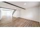 Bright living room with hardwood floors, high ceilings, and a modern staircase at 5245 New Bedford Cir, Las Vegas, NV 89122